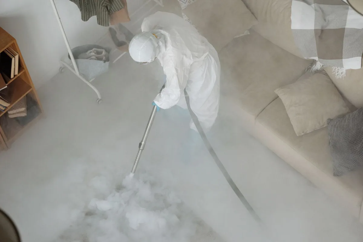 Biohazard cleanup technician in protective equipment, Crooked River Ranch, OR